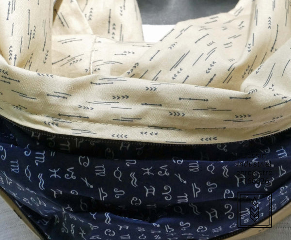 Beige infinity scarf with arrows patterns