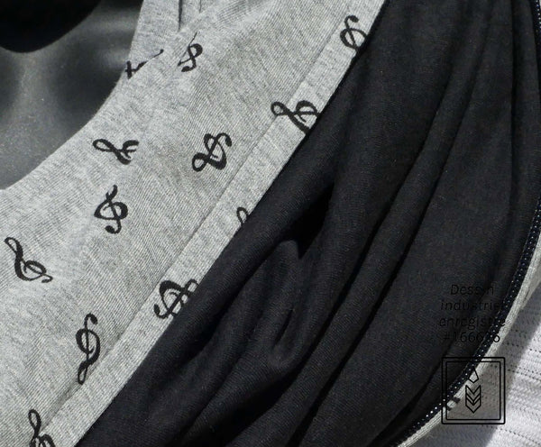 Infinity scarf in gray bamboo with treble clef patterns