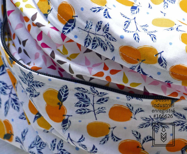 White scarf with orange patterns