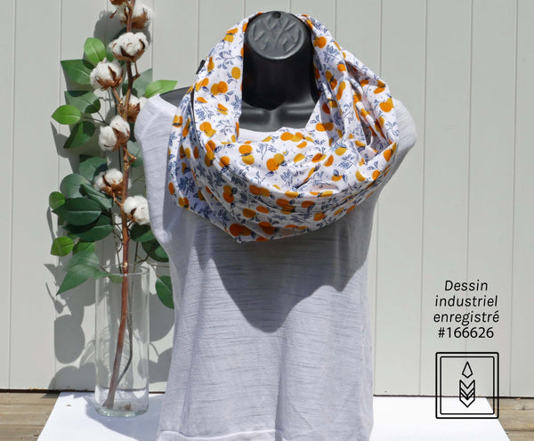 White scarf with orange patterns