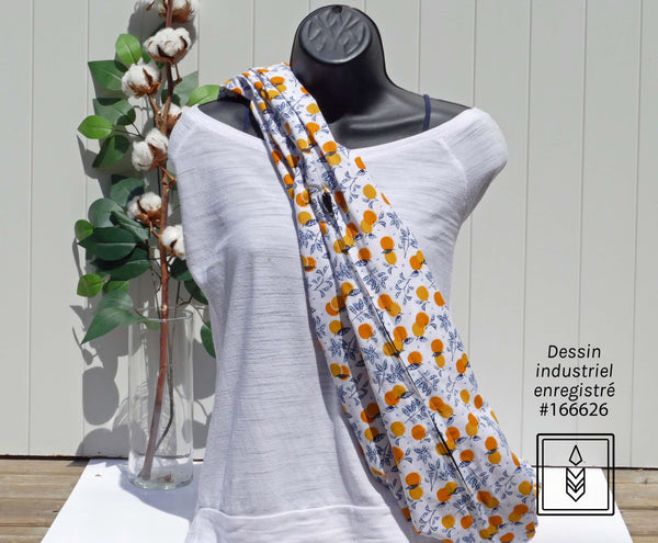 White scarf with orange patterns
