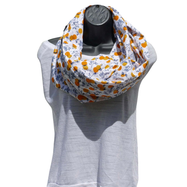 White scarf with orange patterns