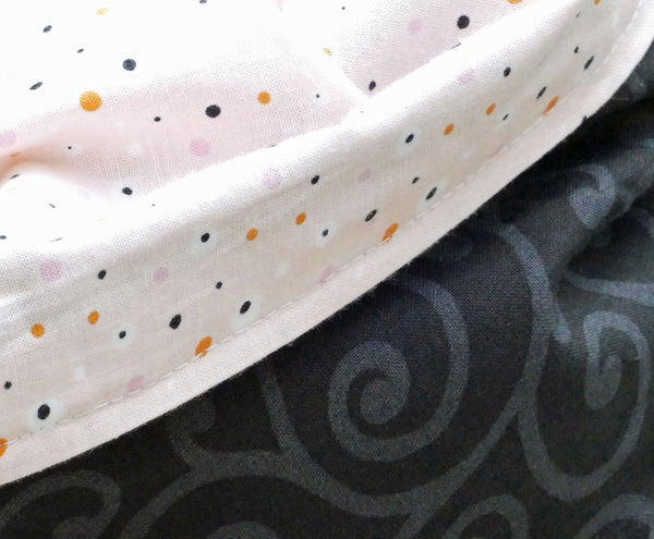 Salmon scarf with polka dot pattern