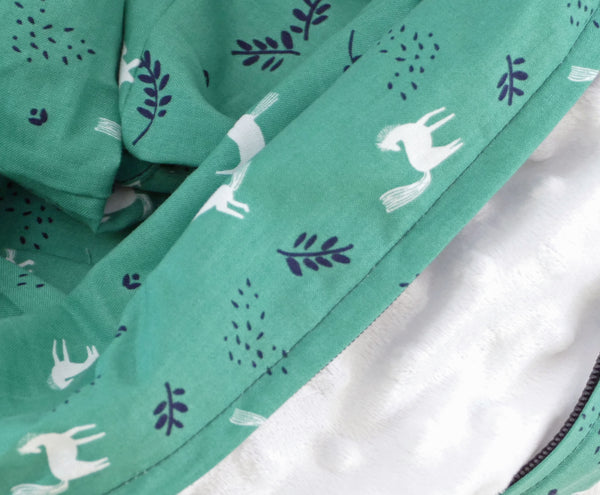 Green infinity scarf with white and dark blue patterns