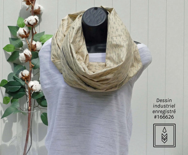 Beige infinity scarf with arrows patterns