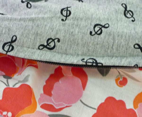 Infinity scarf in gray bamboo with treble clef patterns