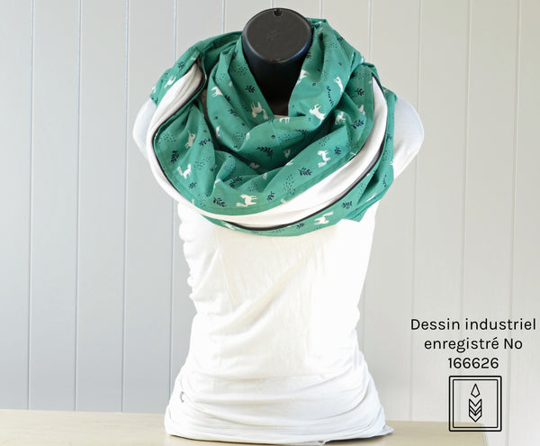 Green infinity scarf with white and dark blue patterns