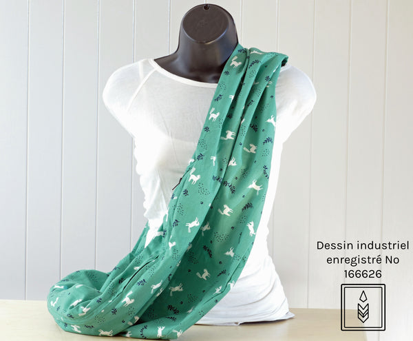 Green infinity scarf with white and dark blue patterns